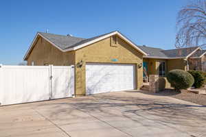 View of front of property featuring a garage