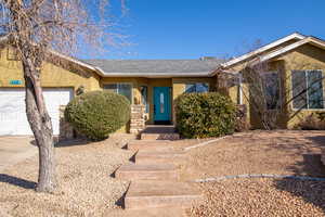 Ranch-style home featuring a garage