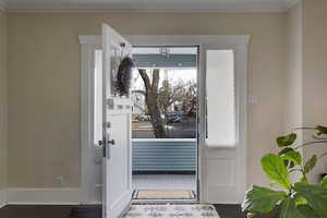 Front entry with beautiful molding and classic charm