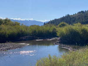 Property view of water with a mountain view