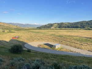 View of mountain feature with a rural view