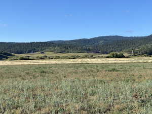 View of mountain feature with a rural view