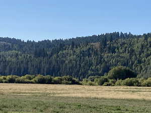 View of mountain feature with a rural view