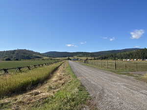 View of street featuring a mountain view and a rural view