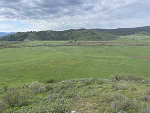 View of mountain feature with a rural view