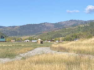 View of mountain feature with a rural view