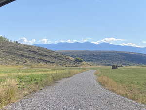 Property view of mountains featuring a rural view