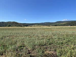 Property view of mountains featuring a rural view