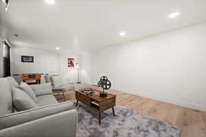 Living room featuring hardwood / wood-style flooring