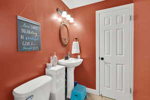 Bathroom featuring toilet and tile patterned floors