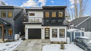 View of front of house with a balcony