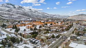 Snowy aerial view with a mountain view