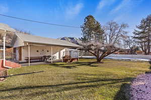 View of yard with a patio