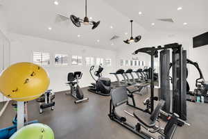 Exercise room with vaulted ceiling