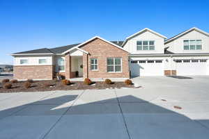 Craftsman inspired home featuring a garage