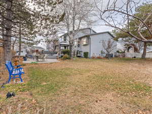 View of large yard featuring a patio area and a gazebo