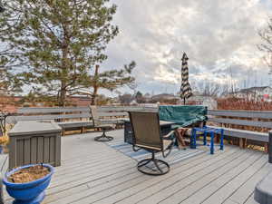 Deck featuring area for grilling