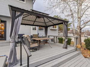 Deck featuring a gazebo