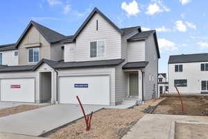 View of front of home featuring a garage