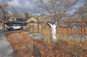 View of yard with a mountain view