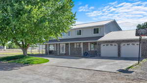 View of front property featuring a garage