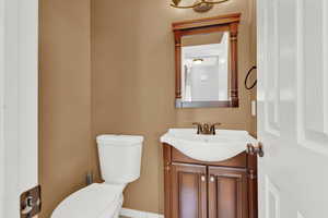 Bathroom with vanity and toilet