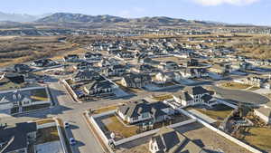 Birds eye view of property with a mountain view