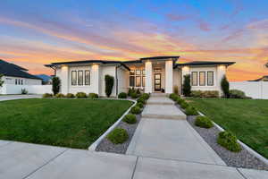 Prairie-style home with a yard