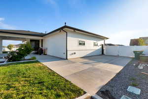 View of side of home featuring rv pad