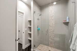 Bathroom featuring walk in shower