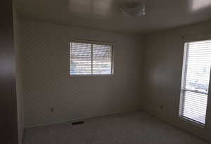 Spare room with carpet floors