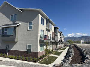 Exterior space with a mountain view and a residential view