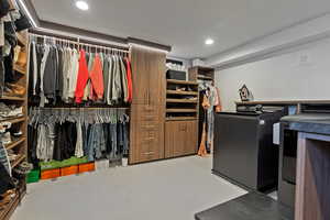 Spacious closet featuring carpet