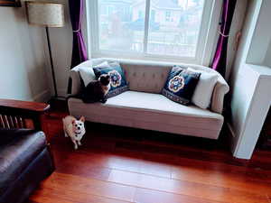 Living room with wood-type flooring