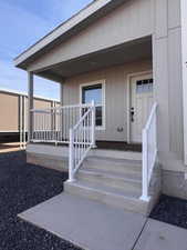 Entrance to property with a porch