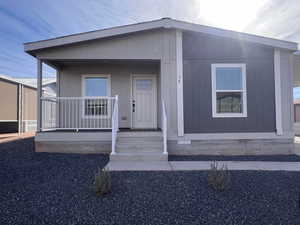 Manufactured / mobile home featuring covered porch