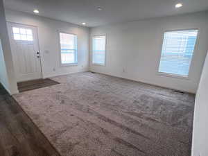 View of carpeted foyer