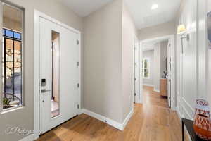 Entryway with light wood-type flooring