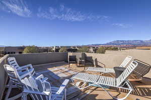 View of patio / terrace with a mountain view