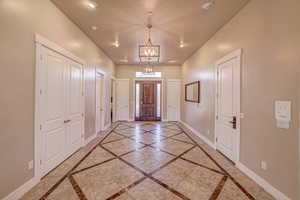 Foyer with a chandelier