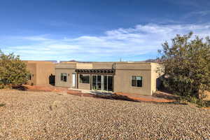 Back of property with a patio area