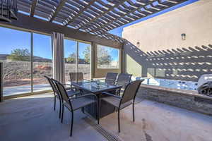 View of patio featuring a pergola