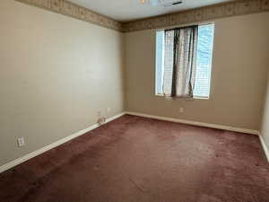 View of carpeted spare room