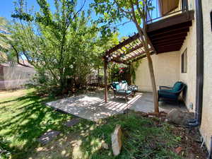 View of patio / terrace featuring a pergola and outdoor lounge area