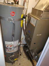 Utilities with heating unit and gas water heater