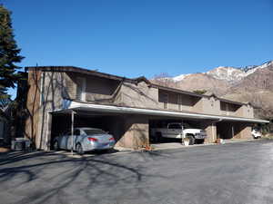 Exterior space with a mountain view and cooling unit