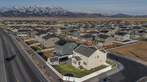 Birds eye view of property with a mountain view