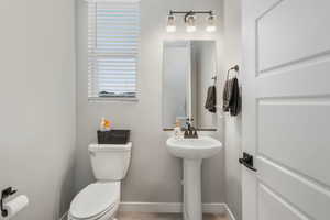 Bathroom with sink and toilet