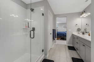 Bathroom with vanity and walk in shower