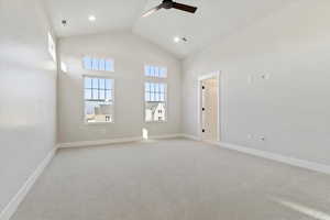 Primary bedroom with vaulted ceiling